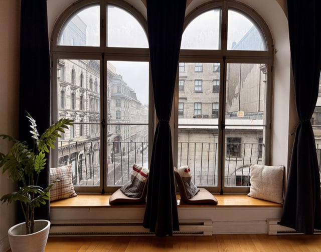 The window reading nooks in our new home are brilliant on a rainy day
